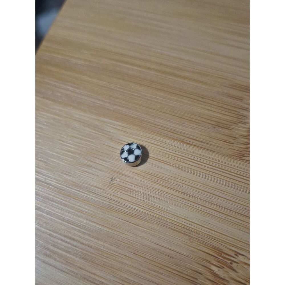 Soccer Button Accent on Purple Fabric